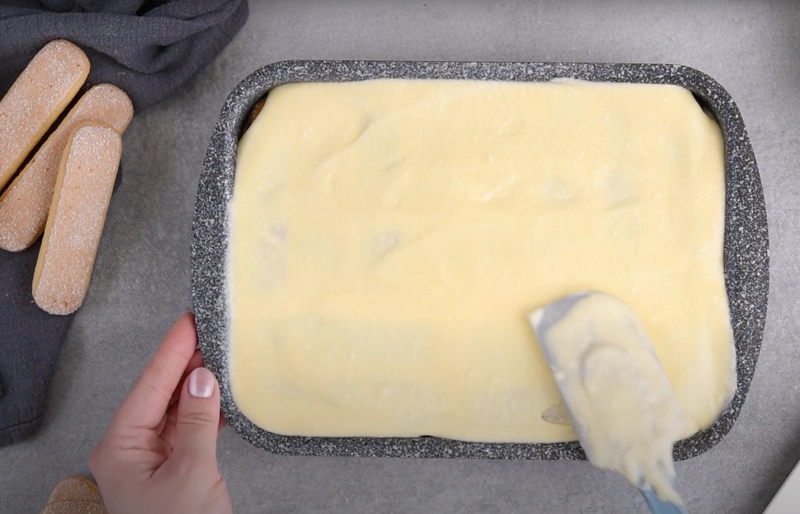 spread tiramisu on ladyfingers