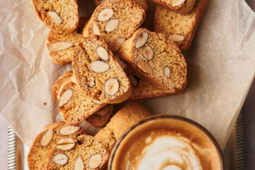 authentic biscotti recipe on a serving table next to a coffee cup