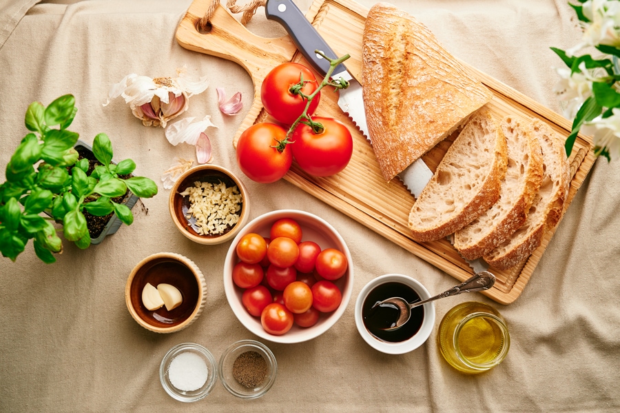 ingredients for bruschetta on a table