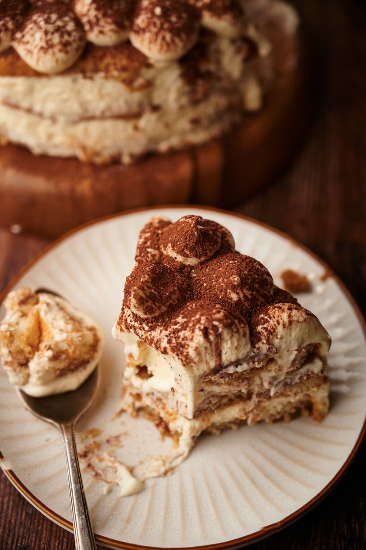 sliced piece of tiramisu layered cake