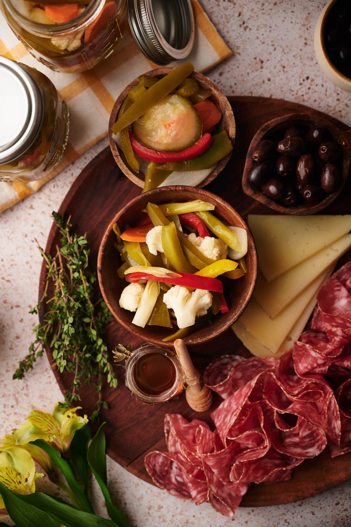 picture of giardiniera pickled vegetables served on a table with other appetizers