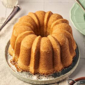 ciambella italian cake on a plate sitting on a table napkin.