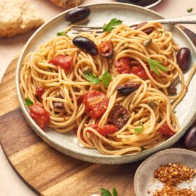 Pasta puttanesca recipe picture in a dish on a table