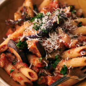 a dish of pasta alla norma close up
