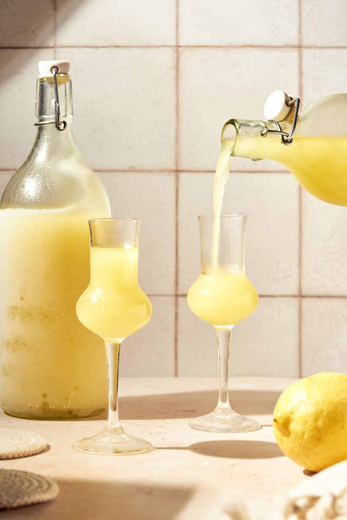 Limoncello poured in two glasses.