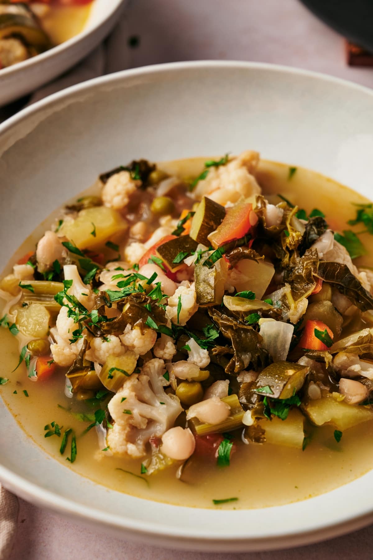 Picture of a bowl of Minestrone soup close up