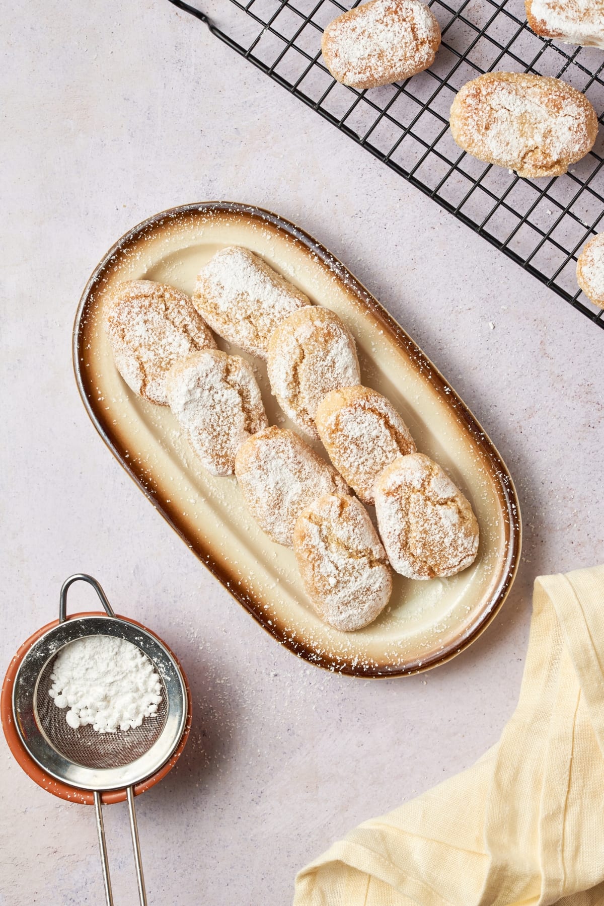 baked ricciarelli on an oval plate