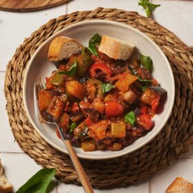 eggplant caponata in a dish on a table