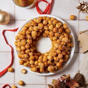 authentic struffoli wrath on a dish on table