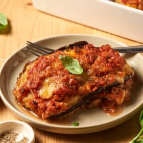 eggplant parmigiana served on a dish