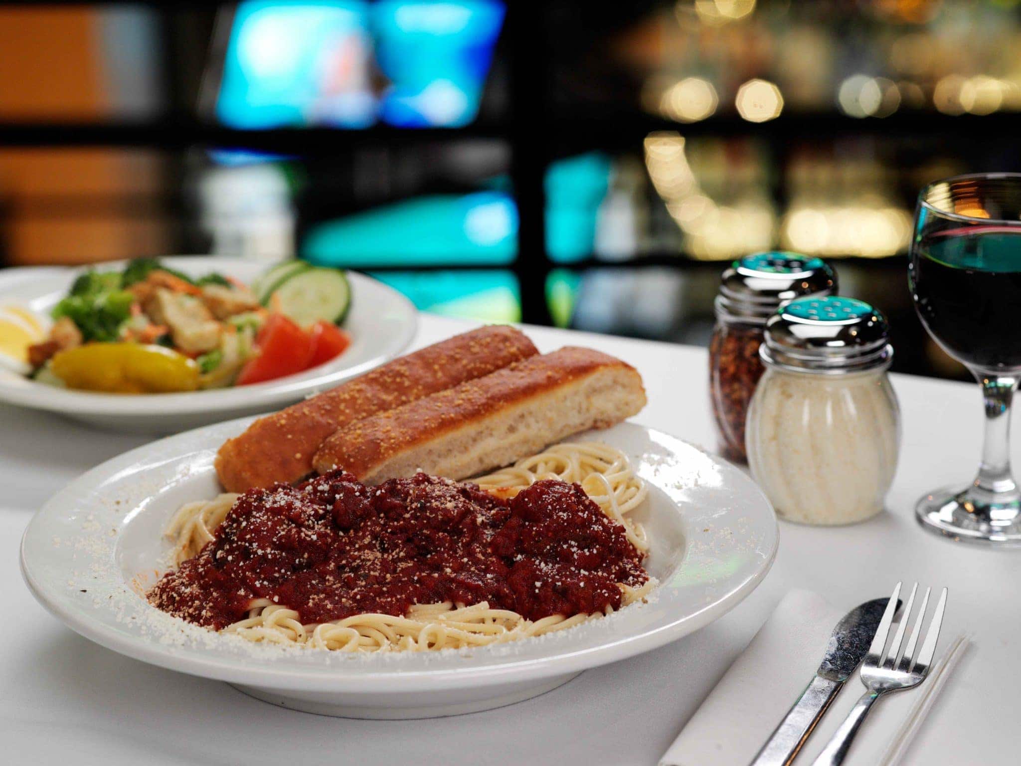 Homemade Italian spaghetti sauce goes well with red wine.